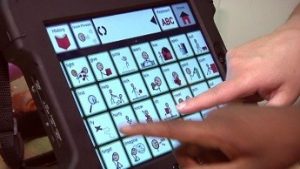 iPad with keyguard being used with an AAC app
