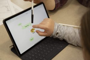 student using accessible tablet